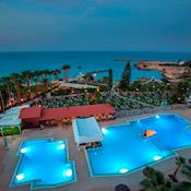 Pool Area and Gardens in Evening - Cavo Maris Beach Hotel